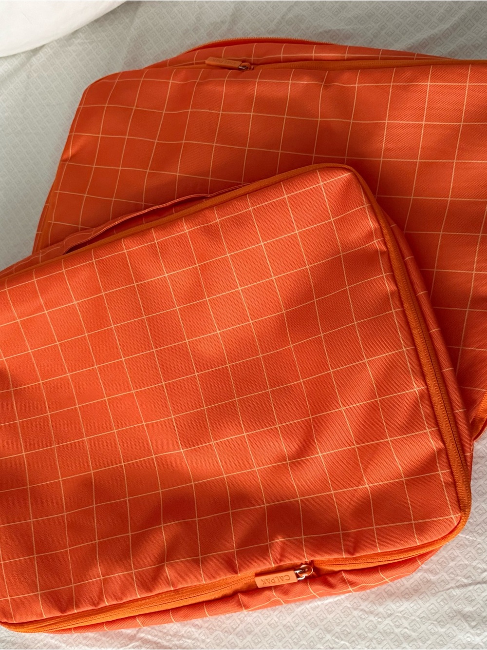 Calpak Orange Grid large size set of two compression Travel Packing Cubes